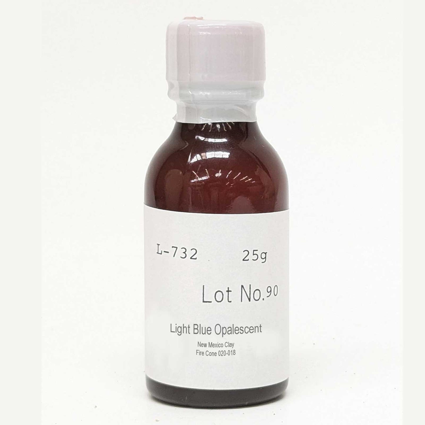 Bottle of light blue opalescent overglaze fire to cone 020.