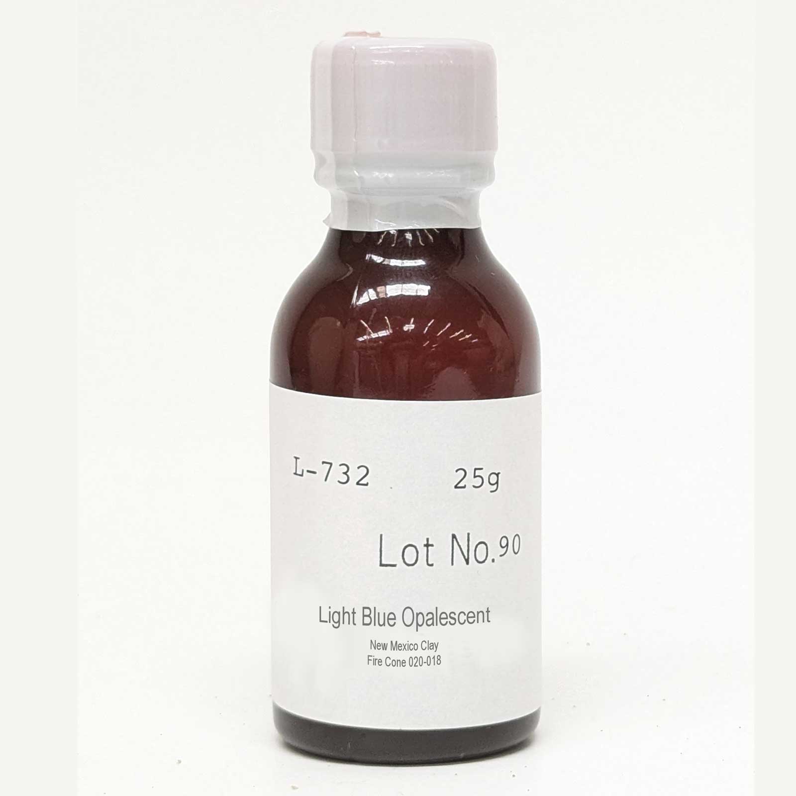 Bottle of light blue opalescent overglaze fire to cone 020.
